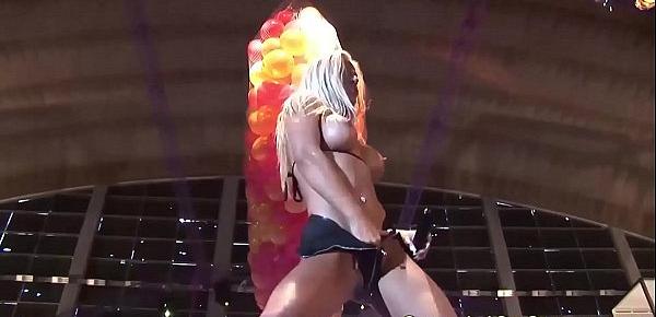  busty oiled Milf on public show stage